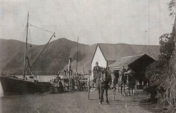 Grove Wharf with ship alongside and horse and cart in foreground. 